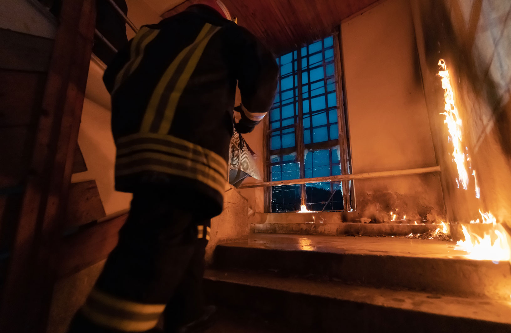 in-building firefighter climbing stairwell